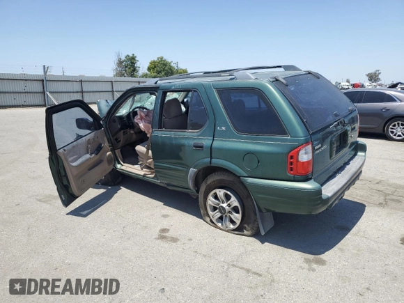 2000 Isuzu Rodeo S with VIN 4S2CK58W2Y4324928, listed as a Copart auction lot 59800375 with Not provided miles and Salvage title. Bid and sale history available at DreamBid. Image 2.