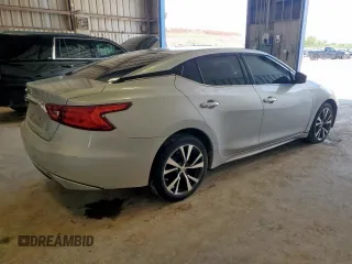 2016 Nissan Maxima Platinum z VIN 1N4AA6AP7GC440845, wystawiony jako Copart lot #60260945 z przebiegiem 129 669 mil mil oraz Szkoda całkowita • Salvage title. Historia ofert i sprzedaży dostępna na DreamBid. Obrazek 3.