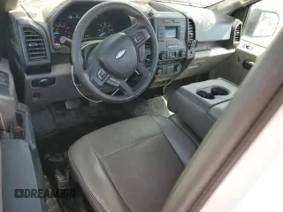 2018 Ford F-150 XL with VIN 1FTMF1CB2JKC31099, listed as a Copart auction lot 52078995 with 219,569 mi miles and Salvage title. Bid and sale history available at DreamBid. Image 8.