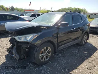 2014 Hyundai Santa Fe z VIN 5XYZUDLB8EG156353, wystawiony jako Copart lot #52005175 z przebiegiem 101 257 mil mil oraz Szkody całkowita. Historia ofert i sprzedaży dostępna na DreamBid. Obrazek 1.