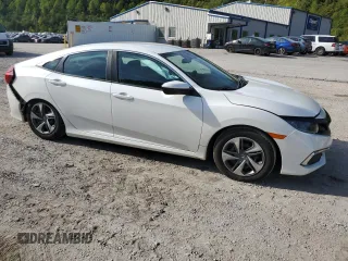 2021 Honda Civic Sedan LX with VIN 2HGFC2F67MH528310, listed as a Copart auction lot 70759164 with 83,554 mi miles and Salvage Title. Bid and sale history available at carsss.com. Image 4.