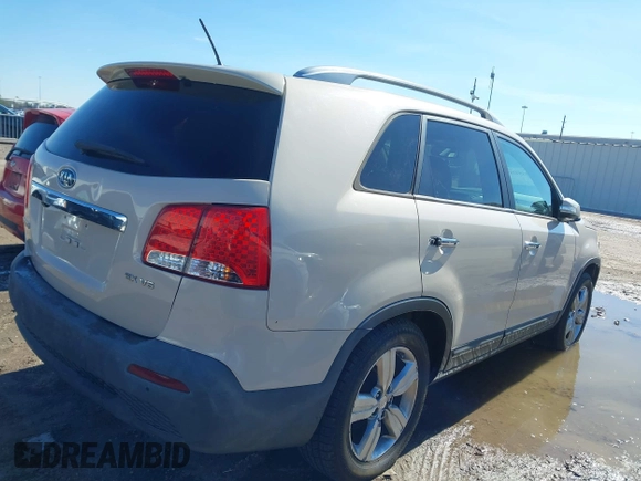 2012 Kia Sorento EX with VIN 5XYKU4A23CG205699, listed as a IAAI auction lot 41384287 with 205,303 mi miles. Bid and sale history available at carsss.com. Image 4.