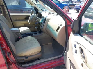 2006 Ford Escape Limited with VIN 1FMCU04116KA47826, listed as a IAAI auction lot 42245373 with 283,827 mi miles and . Bid and sale history available at DreamBid. Image 5.
