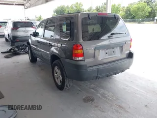 2005 Ford Escape Hybrid with VIN 1FMCU95HX5KD54412, listed as a IAAI auction lot 42115468 with 151,922 mi miles and . Bid and sale history available at DreamBid. Image 3.