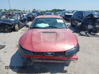 2000 Ford Mustang with VIN 1FAFP4047YF304313, listed as a IAAI auction lot 42397594 with 139,016 mi miles and . Bid and sale history available at DreamBid. Image 12.