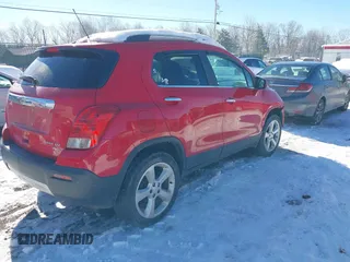 2016 Chevrolet Trax LTZ with VIN KL7CJRSB3GB569465, listed as a IAAI auction lot 41271637 with 152,503 mi miles. Bid and sale history available at carsss.com. Image 4.
