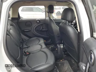 2013 MINI Countryman S ALL4 with VIN WMWZC5C51DWP34357, listed as a Copart auction lot 54945905 with 125,355 mi miles and Salvage title. Bid and sale history available at DreamBid. Image 10.