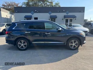2019 Infiniti QX60 Luxe z VIN 5N1DL0MM4KC561014, wystawiony jako Copart lot #43478125 z przebiegiem 177 089 mil mil oraz Szkody całkowita. Historia ofert i sprzedaży dostępna na DreamBid. Obrazek 13.