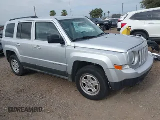 2011 Jeep Patriot Latitude with VIN 1J4NT1GAXBD284096, listed as a IAAI auction lot 42046638 with 121,401 mi miles. Bid and sale history available at carsss.com. Image 1.