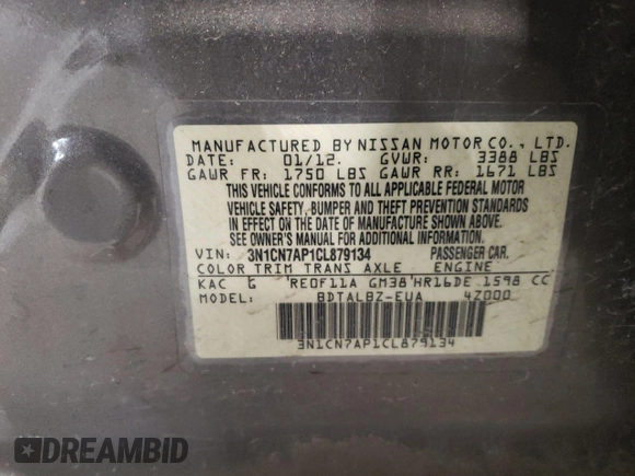 2012 Nissan Versa SV z VIN 3N1CN7AP1CL879134, wystawiony jako Copart lot #43001045 z przebiegiem 88 154 mil mil oraz Szkoda całkowita • Salvage title. Historia ofert i sprzedaży dostępna na DreamBid. Obrazek 14.