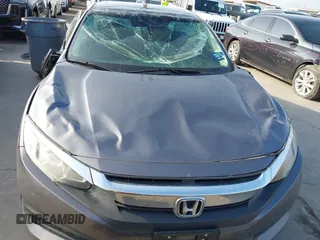 2017 Honda Civic EX z VIN 19XFC2F7XHE056273, wystawiony jako IAAI lot #42087934 z przebiegiem 95 871 mil mil oraz . Historia ofert i sprzedaży dostępna na DreamBid. Obrazek 13.