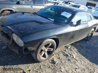2013 Dodge Challenger Rallye Redline with VIN 2C3CDYAG0DH645961, listed as a IAAI auction lot 41210043 with 205,541 mi miles. Bid and sale history available at carsss.com. Image 2.