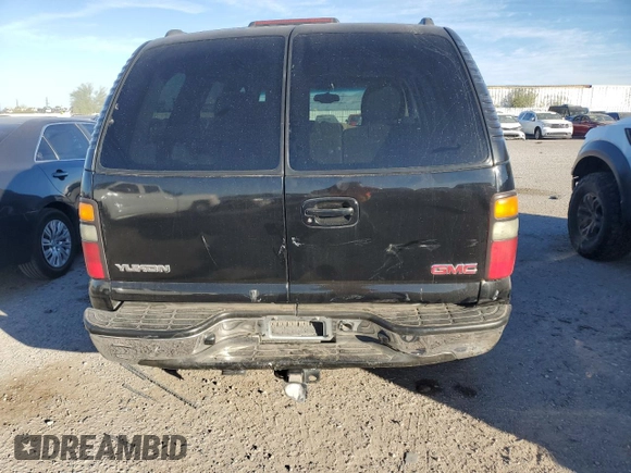 2004 GMC Yukon SLE with VIN 1GKEC13VX4R279540, listed as a Copart auction lot 82689874 with 250,179 mi miles and Salvage Title. Bid and sale history available at carsss.com. Image 6.