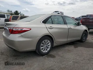 2015 Toyota Camry LE z VIN 4T1BD1FK6FU164748, wystawiony jako Copart lot #54667565 z przebiegiem 139 804 mil mil oraz Szkoda całkowita • Salvage title. Historia ofert i sprzedaży dostępna na DreamBid. Obrazek 3.