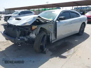 2019 Dodge Charger SXT with VIN 2C3CDXJGXKH706854, listed as a IAAI auction lot 41805578 with 60,240 mi miles and . Bid and sale history available at DreamBid. Image 2.