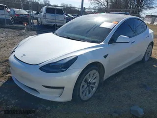 2021 Tesla Model 3 Long Range with VIN 5YJ3E1EB5MF924374, listed as a IAAI auction lot 41447222 with 54,912 mi miles. Bid and sale history available at carsss.com. Image 18.