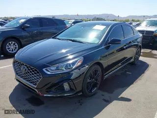 2019 Hyundai Sonata Sport with VIN 5NPE34AF2KH792374, listed as a IAAI auction lot 41987740 with 77,209 mi miles. Bid and sale history available at carsss.com. Image 17.