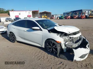 2017 Honda Civic LX with VIN 19XFC2F56HE004511, listed as a IAAI auction lot 42562420 with 59,975 mi miles and . Bid and sale history available at DreamBid. Image 1.