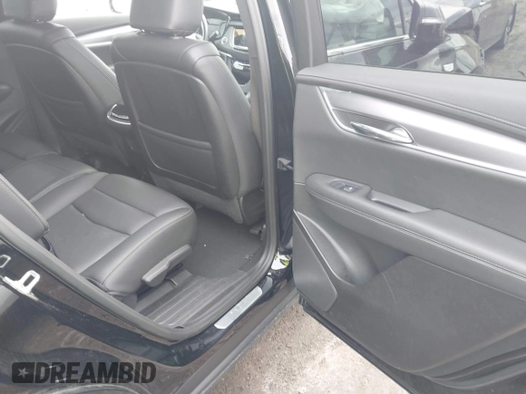 2024 Cadillac XT6 AWD Luxury z VIN 1GYKPBR49RZ723838, wystawiony jako IAAI lot #42346554 z przebiegiem 27 525 mil mil oraz . Historia ofert i sprzedaży dostępna na DreamBid. Obrazek 8.