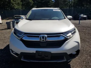 2018 Honda CR-V Touring with VIN 2HKRW2H9XJH619830, listed as a Copart auction lot 53694675 with 95,703 mi miles and Salvage title. Bid and sale history available at DreamBid. Image 5.