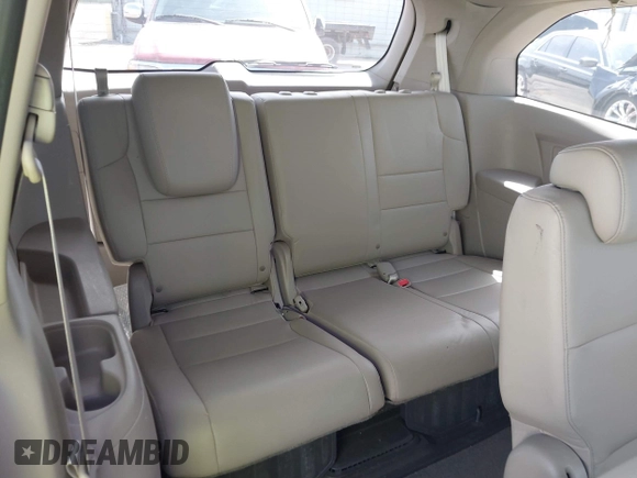 2015 Honda Odyssey EX-L z VIN 5FNRL5H66FB083559, wystawiony jako IAAI lot #41691937 z przebiegiem 101 530 mil mil oraz . Historia ofert i sprzedaży dostępna na DreamBid. Obrazek 18.