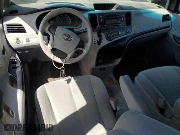 2012 Toyota Sienna with VIN 5TDZK3DC8CS198495, listed as a Copart auction lot 57335205 with 66,786 mi miles and Salvage title. Bid and sale history available at DreamBid. Image 8.