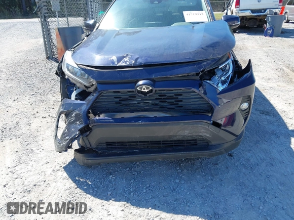 2021 Toyota RAV4 XLE with VIN JTMW1RFV9MD070870, listed as a IAAI auction lot 41719312 with 576,675 mi miles. Bid and sale history available at carsss.com. Image 17.
