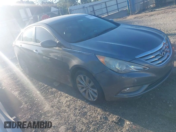 2012 Hyundai Sonata Limited z VIN 5NPEC4AC3CH346998, wystawiony jako IAAI lot #42043048 z przebiegiem 198 027 mil mil oraz . Historia ofert i sprzedaży dostępna na DreamBid. Obrazek 1.