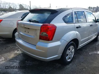 2008 Dodge Caliber SE with VIN 1B3HB28B48D502983, listed as a IAAI auction lot 41429571 with 185,487 mi miles and . Bid and sale history available at DreamBid. Image 6.