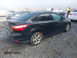 2012 Ford Focus SE with VIN 1FAHP3F25CL256409, listed as a IAAI auction lot 41886182 with 205,975 mi miles. Bid and sale history available at carsss.com. Image 4.