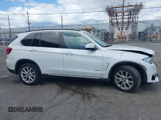 2016 BMW X5 sDrive35i with VIN 5UXKR2C55G0H43136, listed as a IAAI auction lot 41835931 with 125,751 mi miles. Bid and sale history available at carsss.com. Image 13.