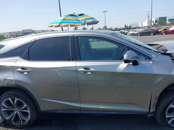 2017 Lexus RX 350 z VIN 2T2ZZMCA3HC041664, wystawiony jako IAAI lot #42379331 z przebiegiem 153 887 mil mil oraz . Historia ofert i sprzedaży dostępna na DreamBid. Obrazek 14.