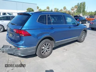 2018 Volkswagen Tiguan SEL with VIN 3VV2B7AX9JM204108, listed as a IAAI auction lot 42504747 with 87,379 mi miles and . Bid and sale history available at DreamBid. Image 4.