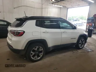 2018 Jeep Compass Limited with VIN 3C4NJDCB1JT212613, listed as a Copart auction lot 58320955 with 124,242 mi miles and Salvage title. Bid and sale history available at DreamBid. Image 3.