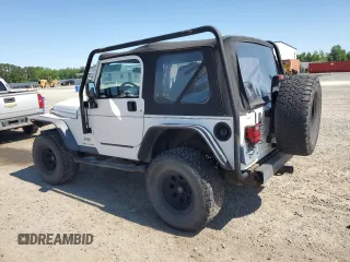 2003 Jeep Wrangler X with VIN 1J4FA39S13P311214, listed as a Copart auction lot 57345175 with 75,088 mi miles and Salvage title. Bid and sale history available at DreamBid. Image 2.