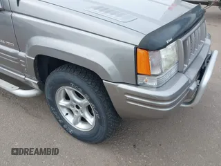 1998 Jeep Grand Cherokee Limited with VIN 1J4GZ88Z6WC307986, listed as a IAAI auction lot 41539972 with 150,652 mi miles. Bid and sale history available at carsss.com. Image 6.