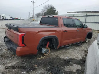 2024 Toyota Tundra TRD Pro Hybrid with VIN 5TFPC5DB6RX076616, listed as a Copart auction lot 43985855 with 7,273 mi miles and Salvage title. Bid and sale history available at DreamBid. Image 3.