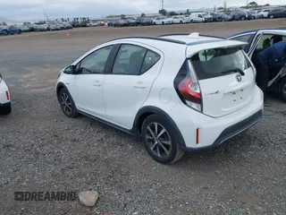 2018 Toyota Prius One with VIN JTDKDTB35J1615449, listed as a IAAI auction lot 42041928 with 59,870 mi miles and . Bid and sale history available at DreamBid. Image 3.