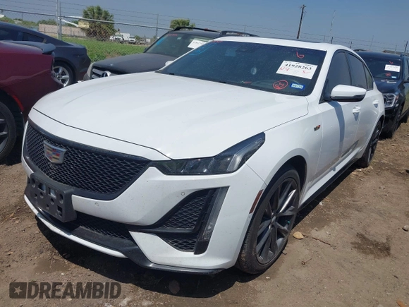 2021 Cadillac CT5 V-Series with VIN 1G6DV5RW2M0128157, listed as a IAAI auction lot 41928263 with 49,698 mi miles and . Bid and sale history available at DreamBid. Image 2.