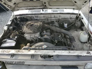 1989 Mazda B-Series Truck z VIN JM2UF3136K0755419, wystawiony jako Copart lot #81501824 z przebiegiem 113 124 mil mil oraz Szkoda całkowita • Salvage title. Historia ofert i sprzedaży dostępna na DreamBid. Obrazek 11.