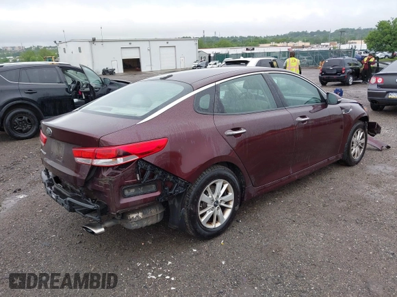 2016 Kia Optima LX with VIN 5XXGT4L31GG053429, listed as a IAAI auction lot 42464513 with 122,397 mi miles and . Bid and sale history available at DreamBid. Image 4.