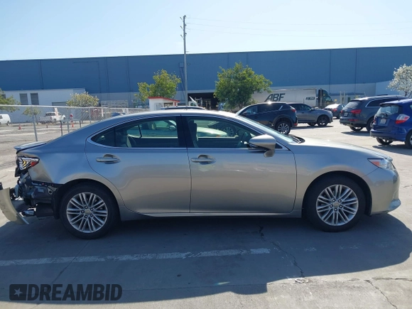 2015 Lexus ES with VIN JTHBK1GG3F2196961, listed as a IAAI auction lot 42003591 with 82,580 mi miles. Bid and sale history available at carsss.com. Image 13.