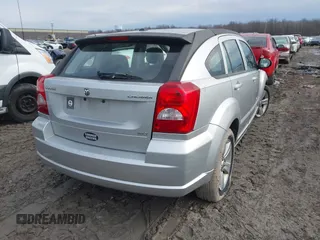 2010 Dodge Caliber SXT z VIN 1B3CB4HA0AD575917, wystawiony jako IAAI lot #41709405 z przebiegiem 213 641 mil mil oraz . Historia ofert i sprzedaży dostępna na DreamBid. Obrazek 4.