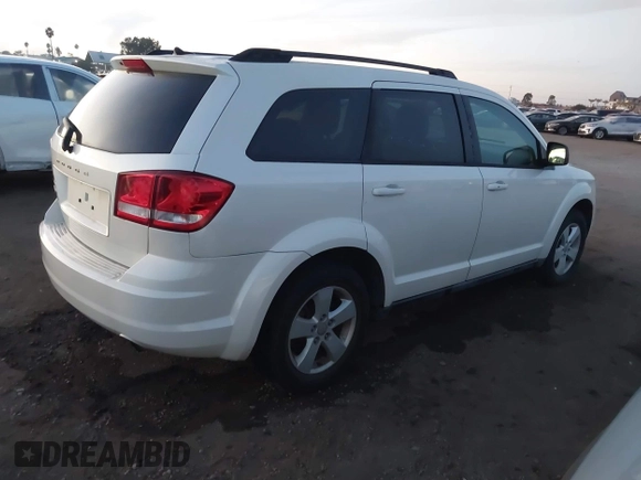 2013 Dodge Journey SE with VIN 3C4PDCAB2DT547459, listed as a IAAI auction lot 41254288 with 116,740 mi miles and . Bid and sale history available at DreamBid. Image 4.