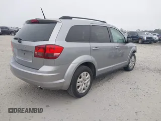 2018 Dodge Journey SE with VIN 3C4PDCAB9JT520769, listed as a IAAI auction lot 41545197 with 115,692 mi miles and . Bid and sale history available at carsss.com. Image 4.