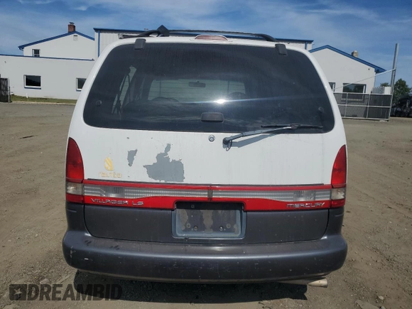 1998 Mercury Villager z VIN 4M2ZV1113WDJ23650, wystawiony jako Copart lot #70613834 z przebiegiem Nie podano mil oraz Szkody całkowita. Historia ofert i sprzedaży dostępna na DreamBid. Obrazek 6.
