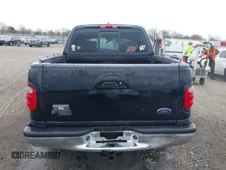 2002 Ford F-150 XLT with VIN 1FTRW08L32KD90202, listed as a IAAI auction lot 41850546 with 256,807 mi miles. Bid and sale history available at carsss.com. Image 16.
