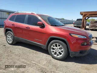 2017 Jeep Cherokee Latitude with VIN 1C4PJLCB2HW585988, listed as a Copart auction lot 48169725 with 103,538 mi miles and Salvage Title. Bid and sale history available at DreamBid. Image 4.