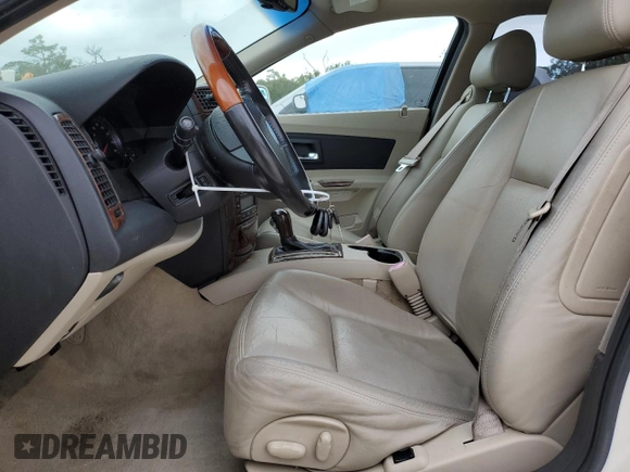 2005 Cadillac CTS with VIN 1G6DP567150167251, listed as a Copart auction lot 76671174 with 121,541 mi miles and Non Repairable. Bid and sale history available at carsss.com. Image 7.