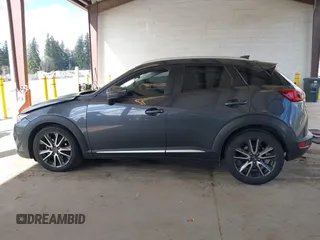 2017 Mazda CX-3 Grand Touring z VIN JM1DKFD70H0150496, wystawiony jako IAAI lot #41746038 z przebiegiem 108 091 mil mil oraz . Historia ofert i sprzedaży dostępna na DreamBid. Obrazek 15.